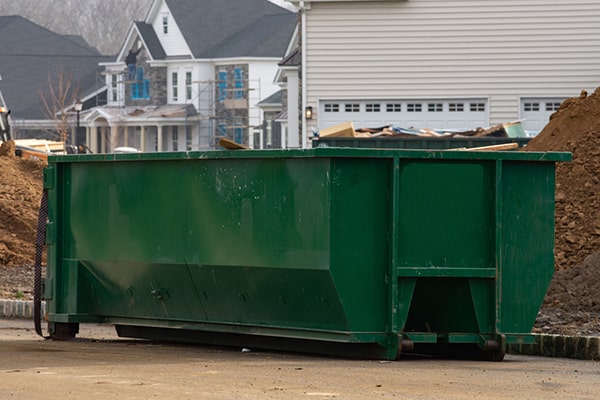 construction dumpsters have restrictions on hazardous materials, liquids, and certain electronic waste items
